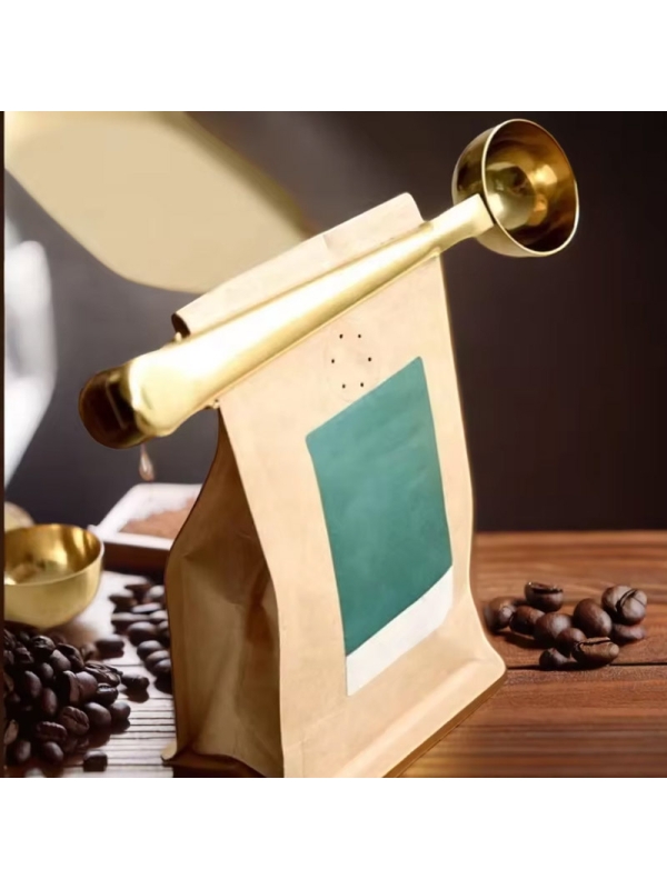 Cuillère doseuse pour café et tisanes, avec clip de fermeture du sachet