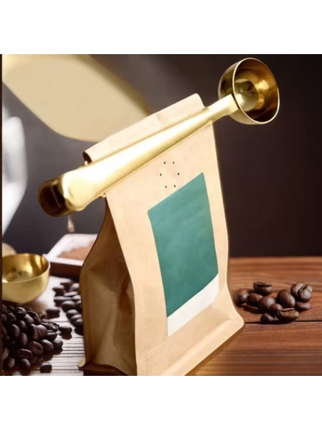 Cuillère doseuse pour café et tisanes, avec clip de fermeture du sachet